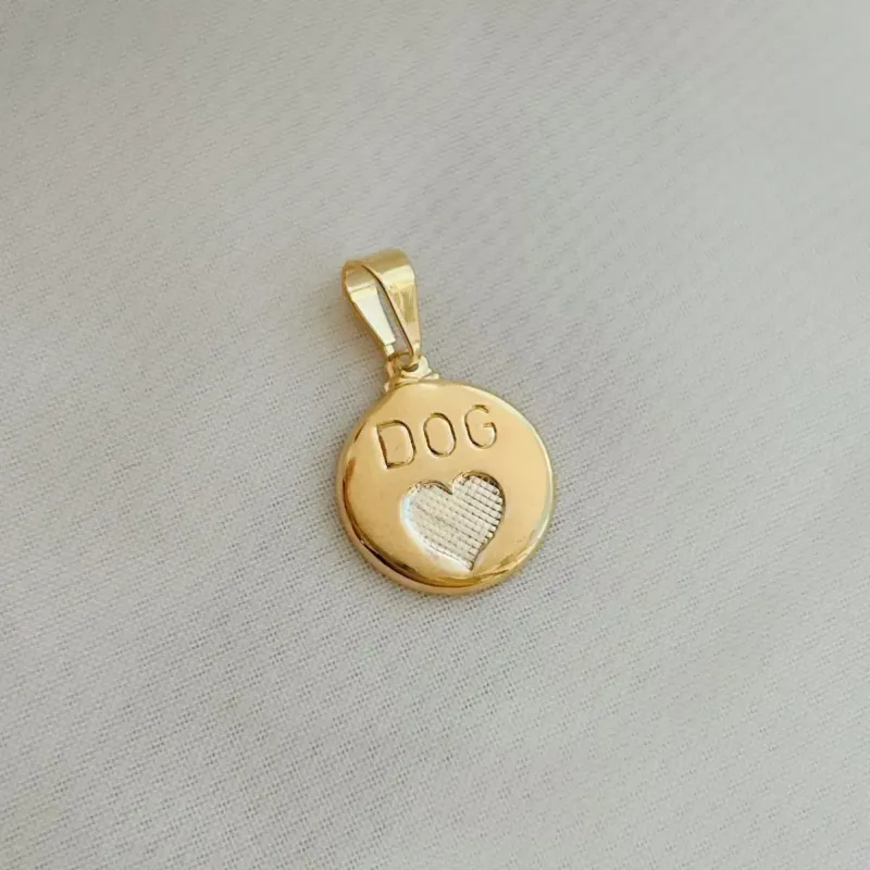 PINGENTE MEDALHA DOG. BANHADO A OURO 18K.