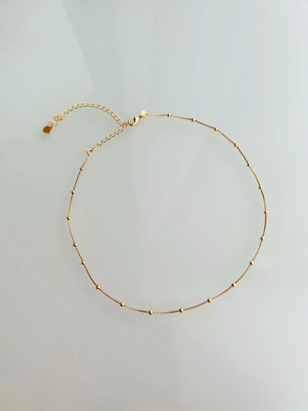 Choker de bolinhas. 35cm de comprimento + 10cm de extensor. Banhado a ouro 18K