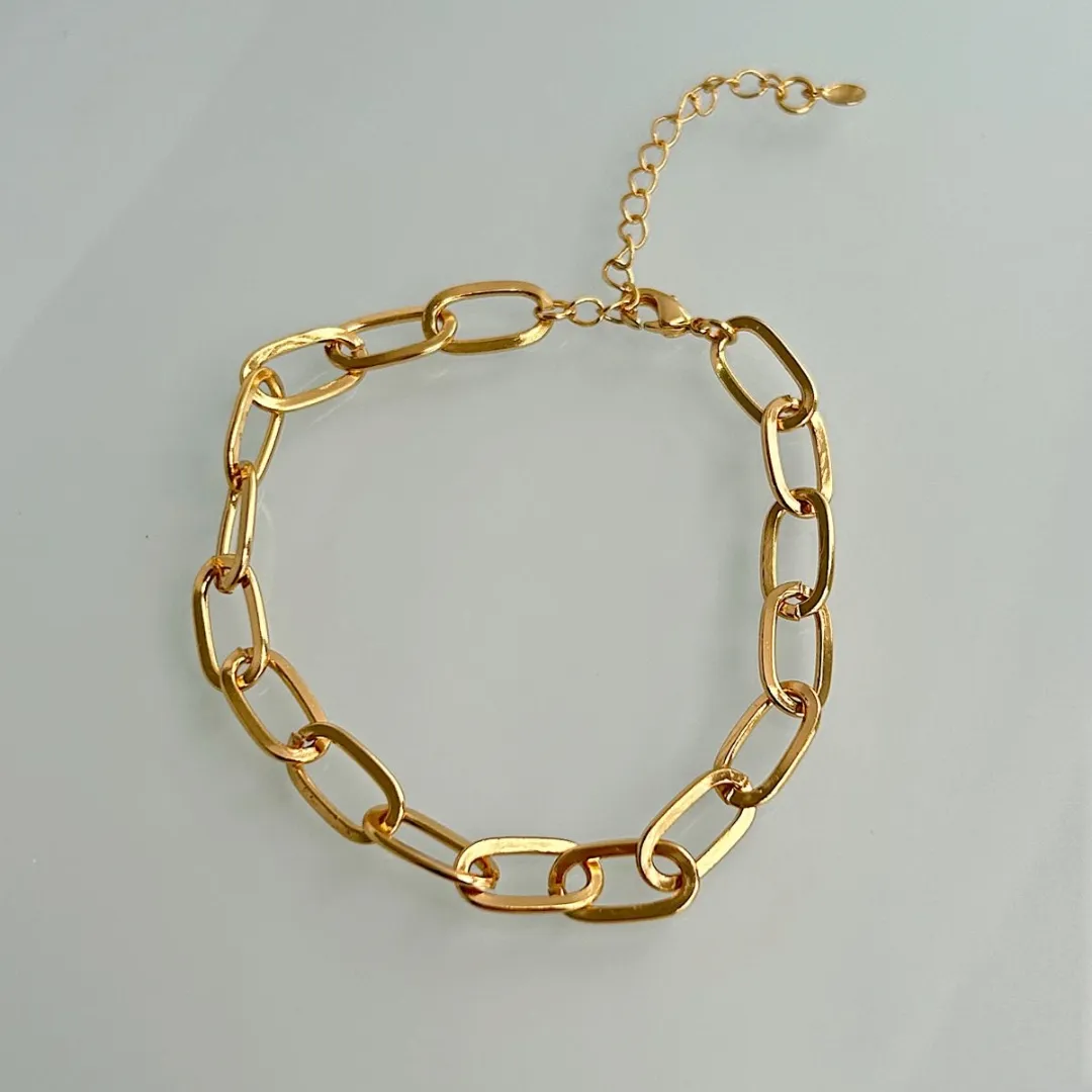 PULSEIRA ELOS COMPRIDOS OVAIS. 18CM DE COMPRIMENTO E 5CM DE REGULAGEM. BANHADA A OURO 18K.