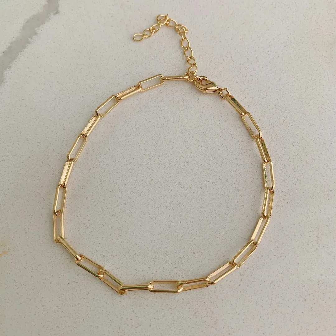 PULSEIRA ELO CARTIER COM 3MM DE ESPESSURA. 20CM DE COMPRIMENTO E 5CM DE REGULAGEM. BANHADO A OURO 18K.